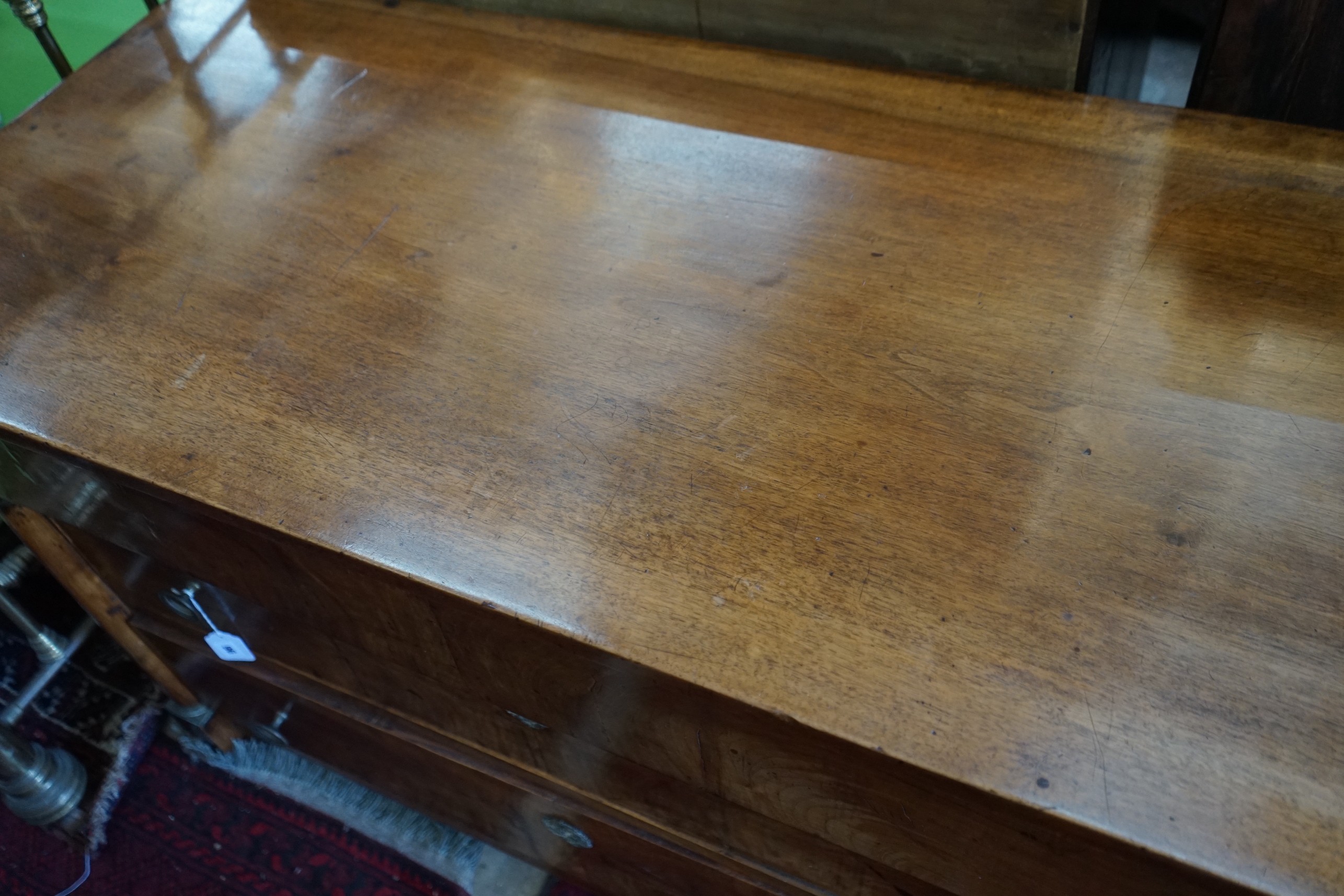 An early 19th century mahogany commode, width 124cm, depth 57cm, height 82cm